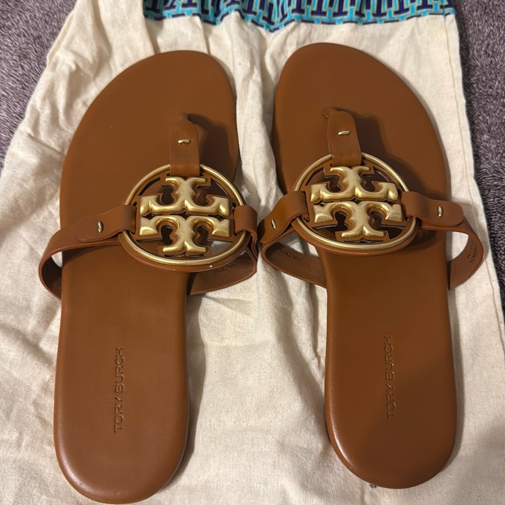 Brown and gold Miller Tory Burch sandals.